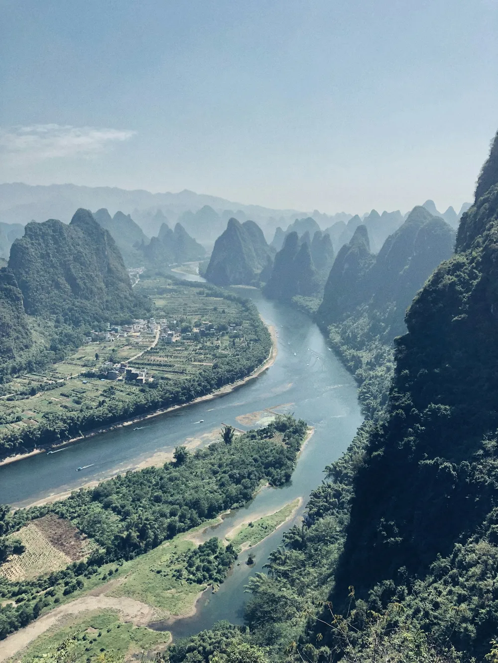 China's dramatic landscape reflected in calm water