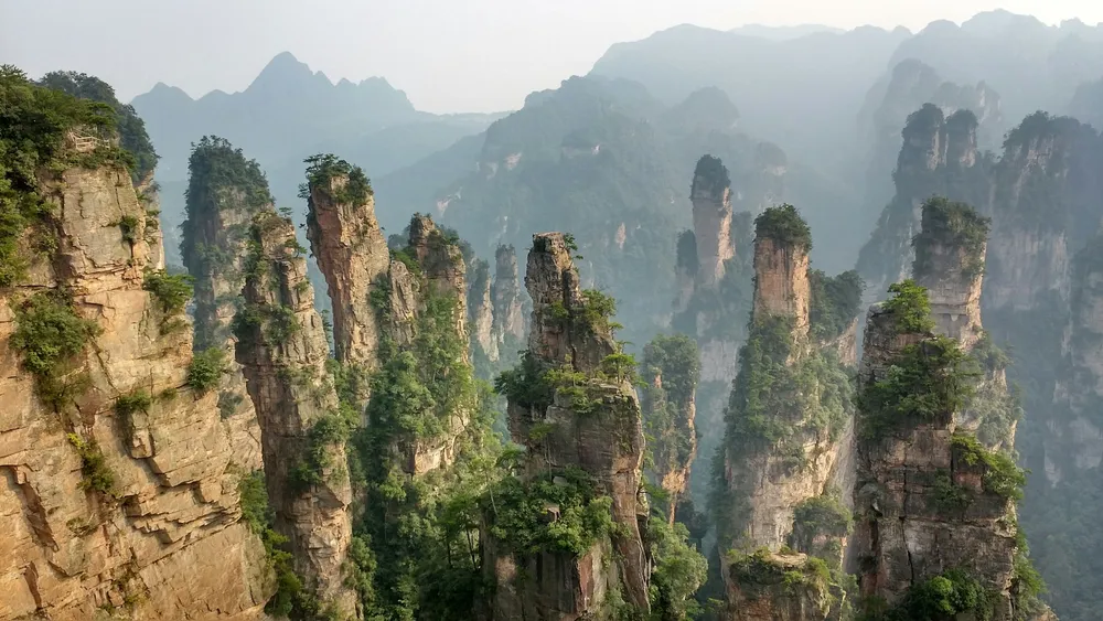 Layered forested mountains in China